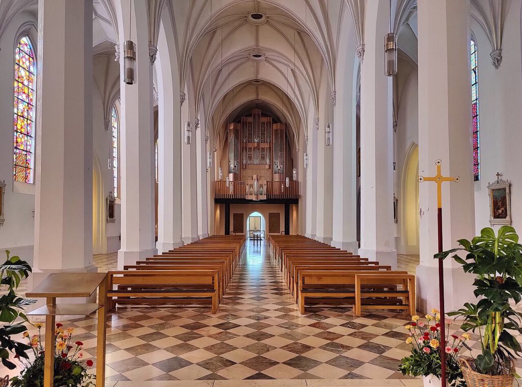 The nave of St Nikolaus, Rosenheim, looking towards the organ in the west-end gallery.