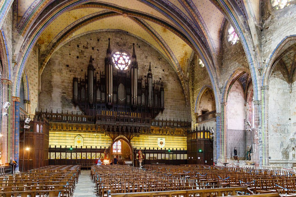 Interior view of Mirepoix Cathedral, looking down the nave towards the organ in the west gallery.