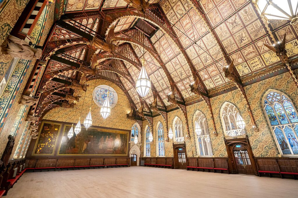 The interior of the Great Hall in Rochdale Town Hall with its highly ornate Victorian Gothic decoration.