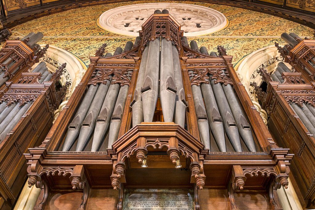 A close-up view from below of the front pipes of the Binns organ in the Great Hall, Rochdale Town Hall
